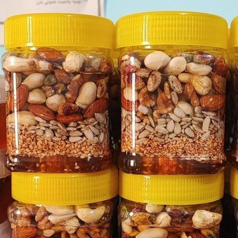 معجون عسل 7مغز اقتصادی سوپر لوکس ((پسته ،، بادام ،گردو ، بادام هندی، بادام زمینی، کنجد ،، تخم آفتبگردان ))
